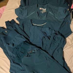Set of 4 scrubs.